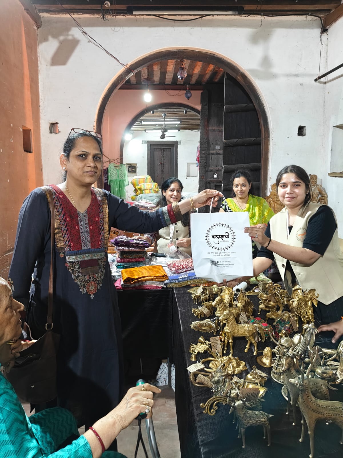 Visitors engaging with crafts at KalaSaathi stall